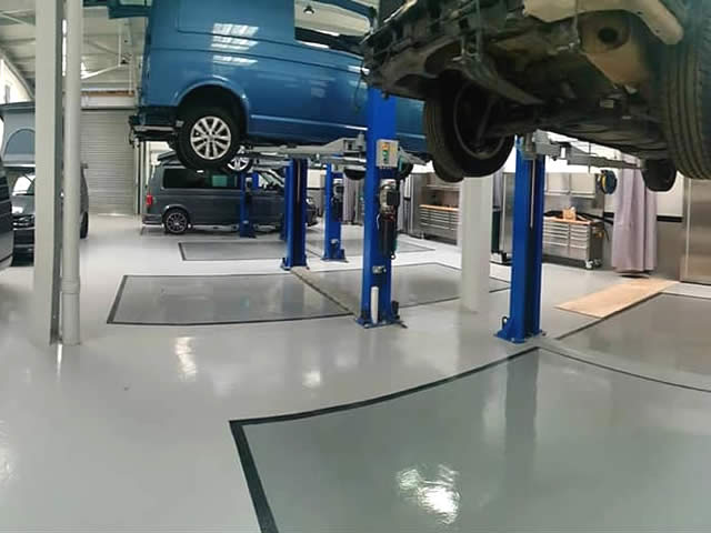 https://www.pscflooring.co.uk/wp-content/uploads/2020/02/garage-auto-workshop-flooring-pic.jpg
